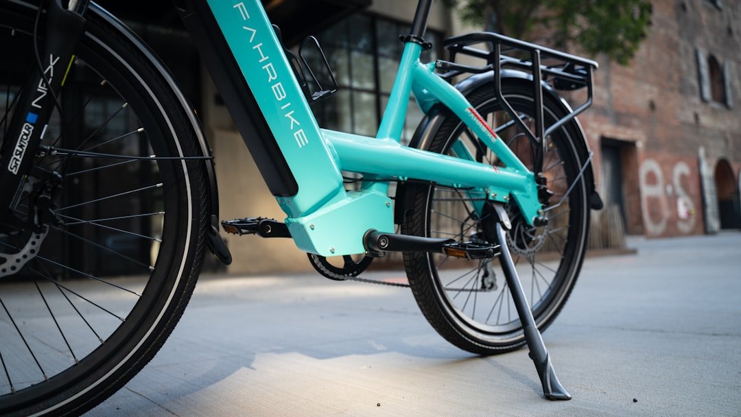 a-bicycle-parked-on-pavement-yx8felfi6gy
